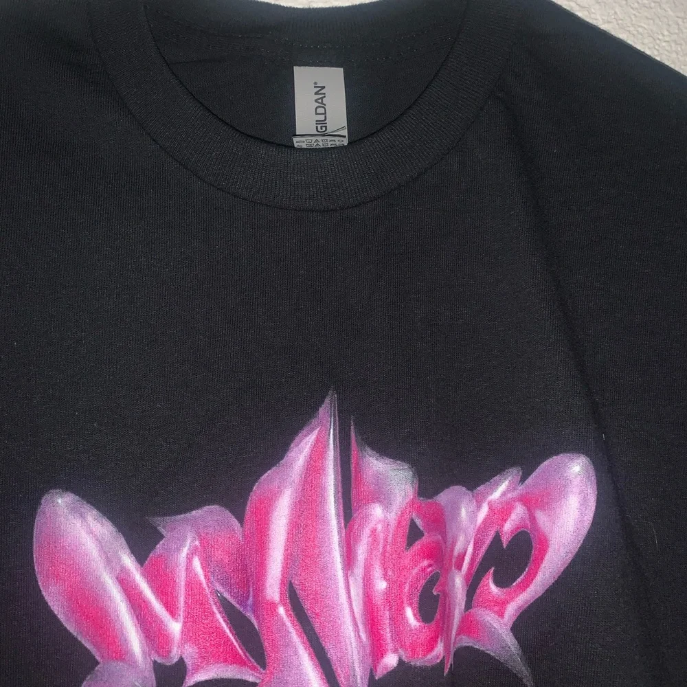 Black Graphic Tee with Pink Design